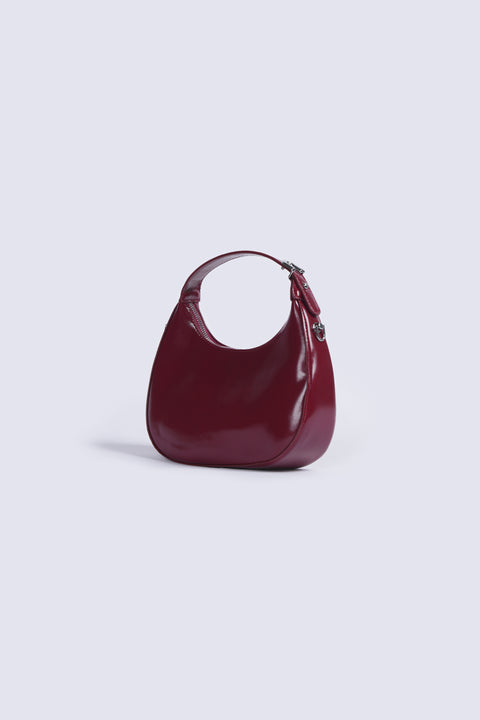 PATENT CRESCENT BAG