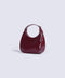 PATENT CRESCENT BAG