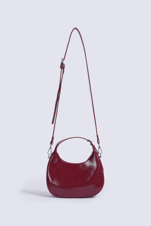 PATENT CRESCENT BAG