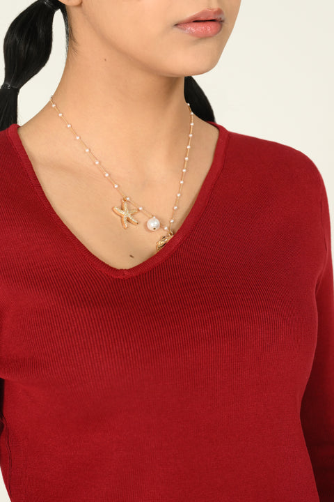 ASSYMETRICAL KNIT TOP