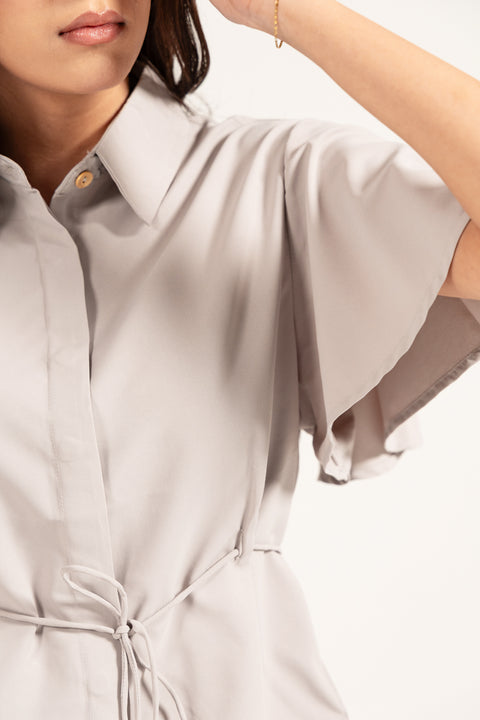 BUTTON DOWN SHIRT WITH TASSEL DETAIL