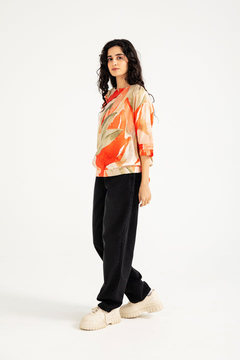 PRINTED TOP WITH HEM DETAIL