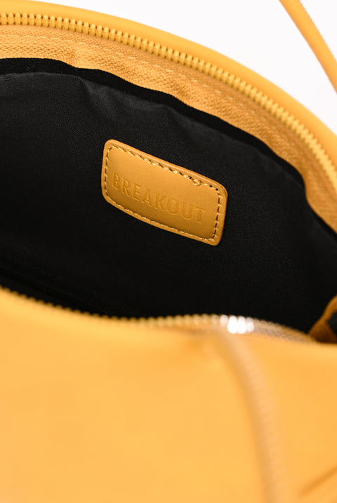 ELONGATED TRAPEZE SHOULDER BAG