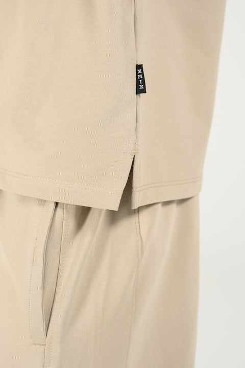 STRETCH TEXTURED ZIP PLACKET POLO
