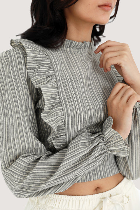 TOP WITH HEM DETAIL
