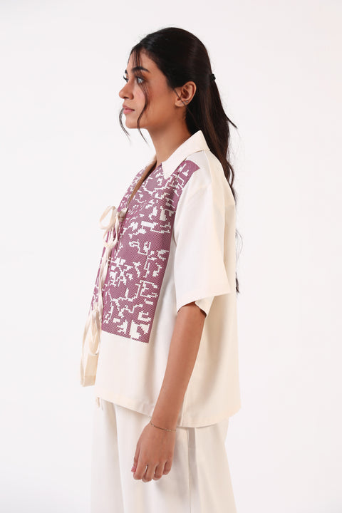 GRAPHIC TOP WITH TIE DETAIL